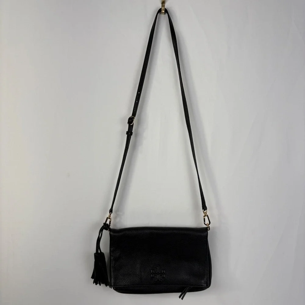 Tory Burch Thea Messenger Bag Black Pebbled Leather Tassel Crossbody Gold Logo